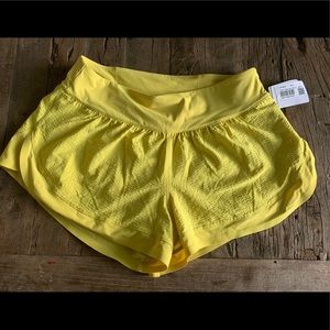 Yellow Lululemon shorts